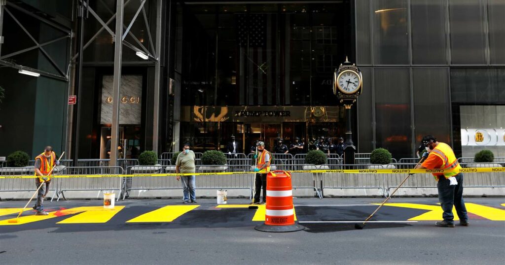 Red paint splashed on Black Lives Matter mural in front of Trump Tower