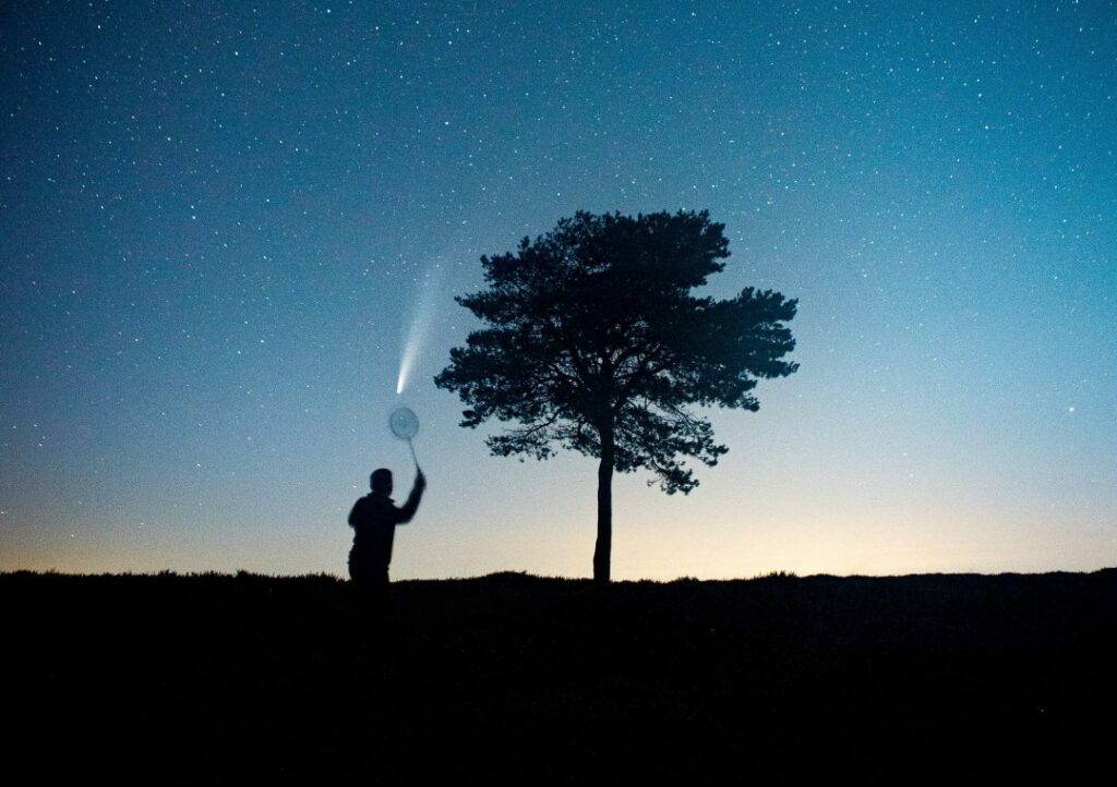 Man 'plays' badminton with NEOWISE comet in viral photo