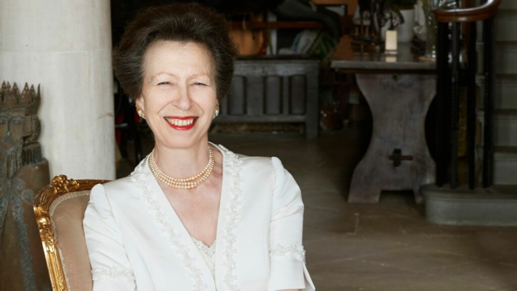 Princess Anne smiled as she wore a flowing evening dress