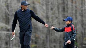 Tiger Woods is doing a warm-up with his 11-year-old son Charlie, and the similarities are stunning