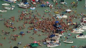 Michigan coronavirus: Revelers celebrated the July 4 weekend at a Michigan lake. Now some have Covid-19