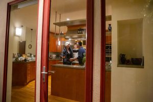 Jennifer Doudna celebrating with her husband and son in their home