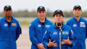 NASA astronauts Shannon Walker, Victor Glover, Mike Hopkins and JAXA astronaut Soichi Noguchi at Kennedy Space Centre