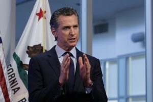 California Gov. Gavin Newsom imposes new restrictions to curb the Coronavirus