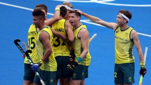 Australia and Germany won their matches in the men's hockey championship