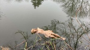 The Body of Christ is located on the cross of the two miles fire station in the pond of the neighboring village.  The arms are torn.